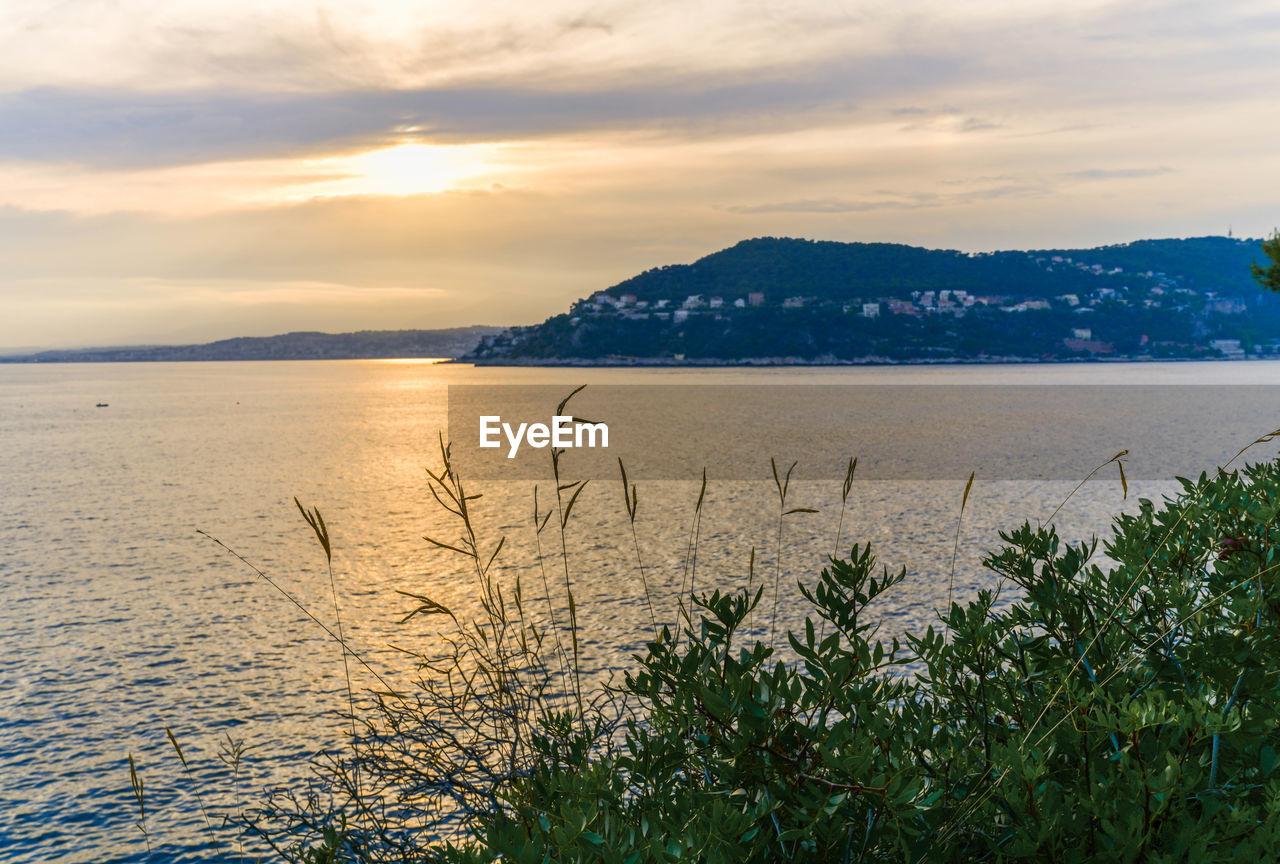 Scenic view of sea against sky during sunset