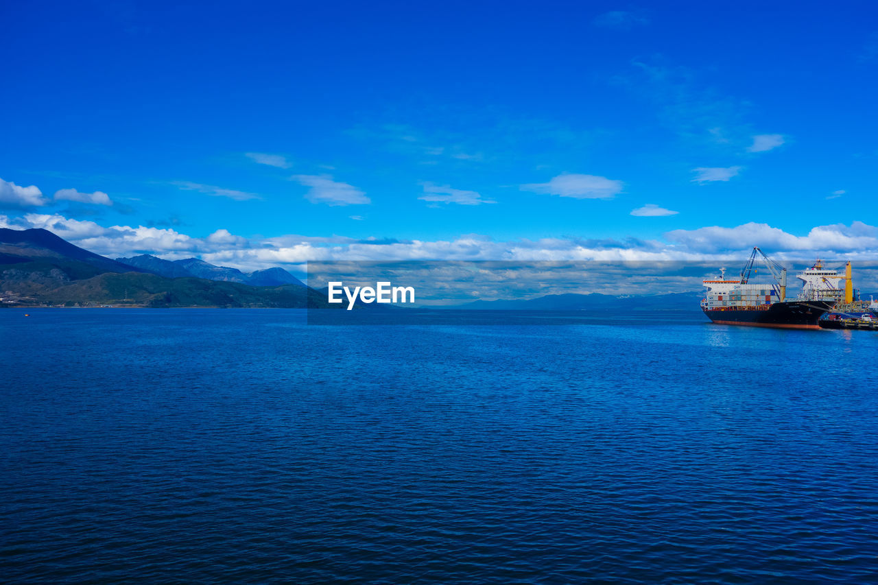 SCENIC VIEW OF BLUE SEA AGAINST SKY