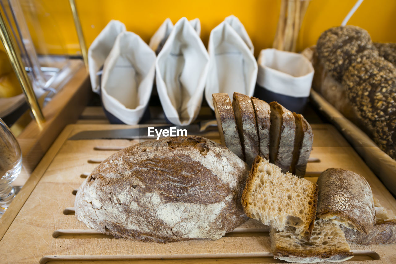 Close-up of breads on cutting board