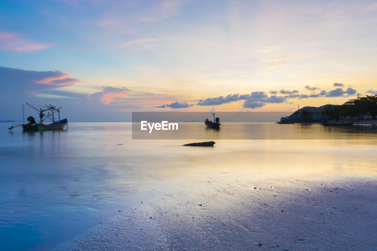 SCENIC VIEW OF SEA DURING SUNSET