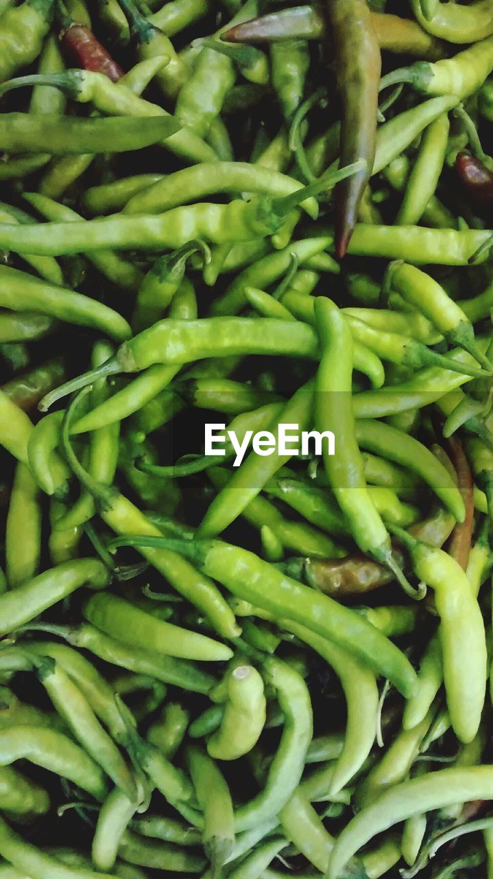 Full frame shot of green chili peppers