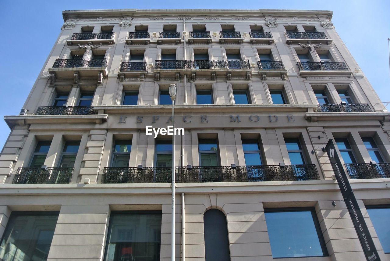 LOW ANGLE VIEW OF MODERN BUILDINGS