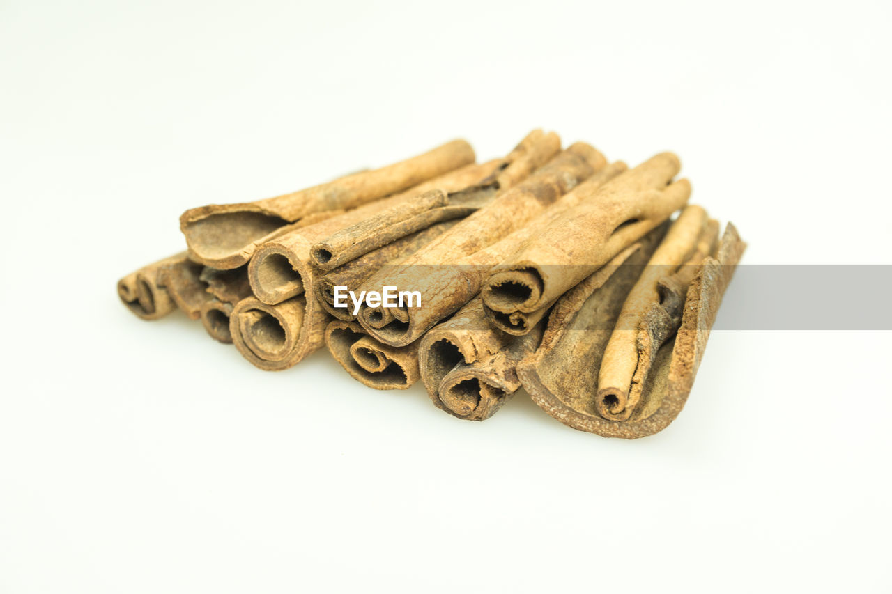 HIGH ANGLE VIEW OF BREAD ON WHITE BACKGROUND