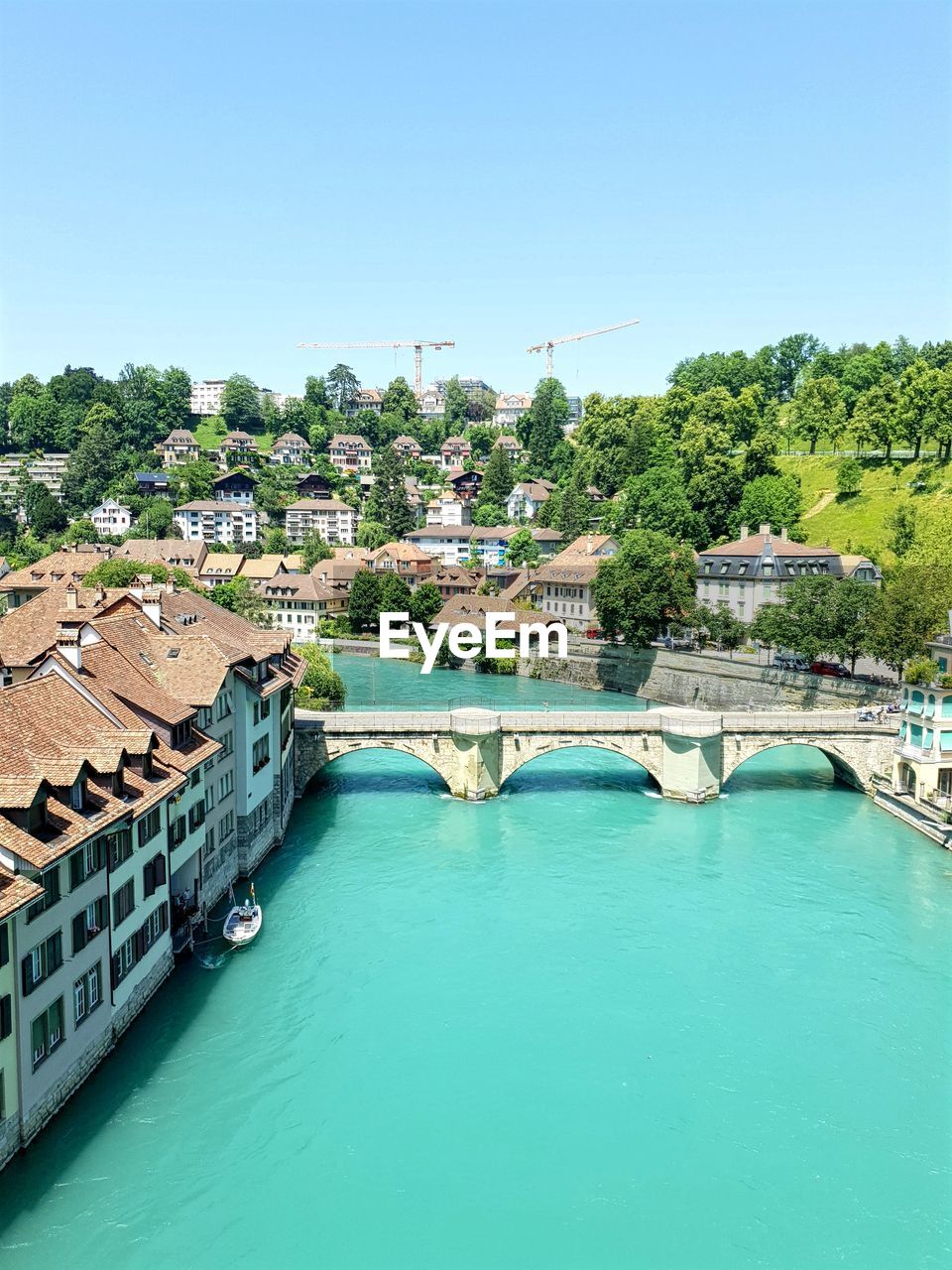 High angle view of river against buildings