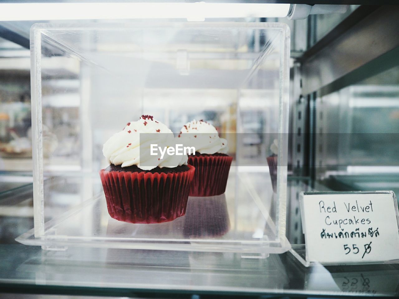 CLOSE-UP OF CUPCAKES ON GLASS