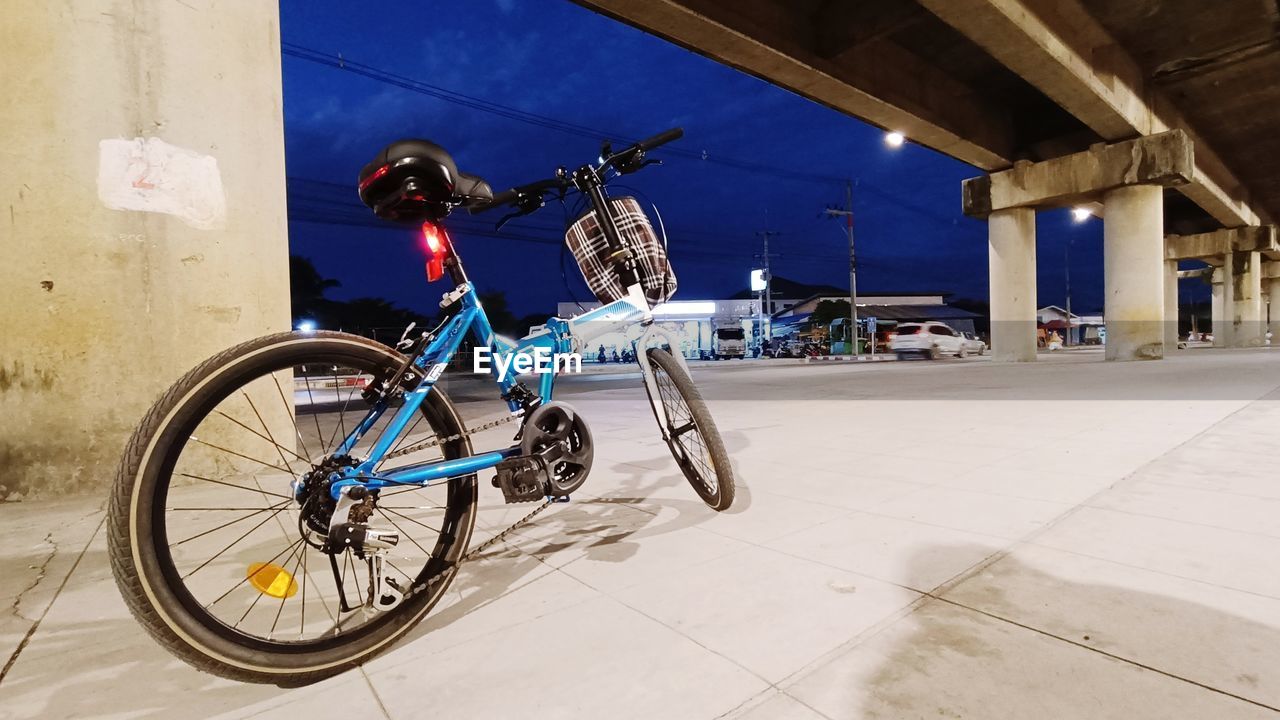 transportation, bicycle, mode of transportation, vehicle, architecture, cycle sport, bicycle motocross, sports, land vehicle, built structure, cycling, bmx bike, activity, city, sports equipment, mountain bike, building exterior, travel, bmx cycling, outdoors, one person, blue