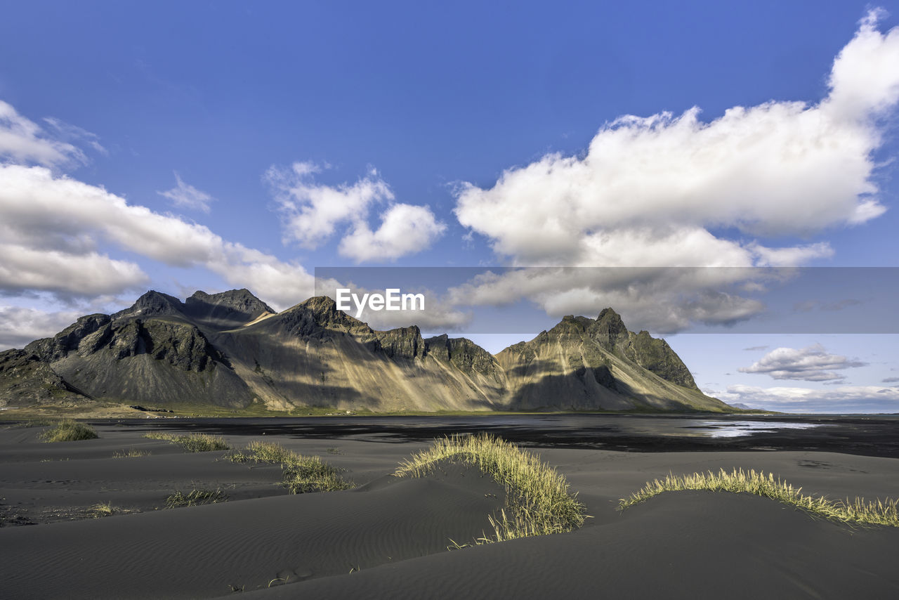 Panoramic view of landscape and mountains against sky