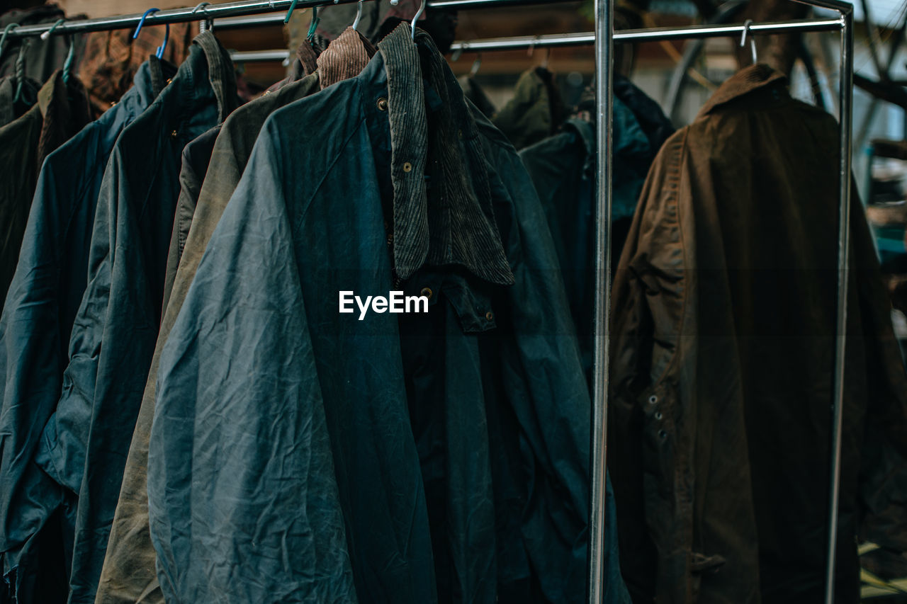 close-up of clothes hanging in store