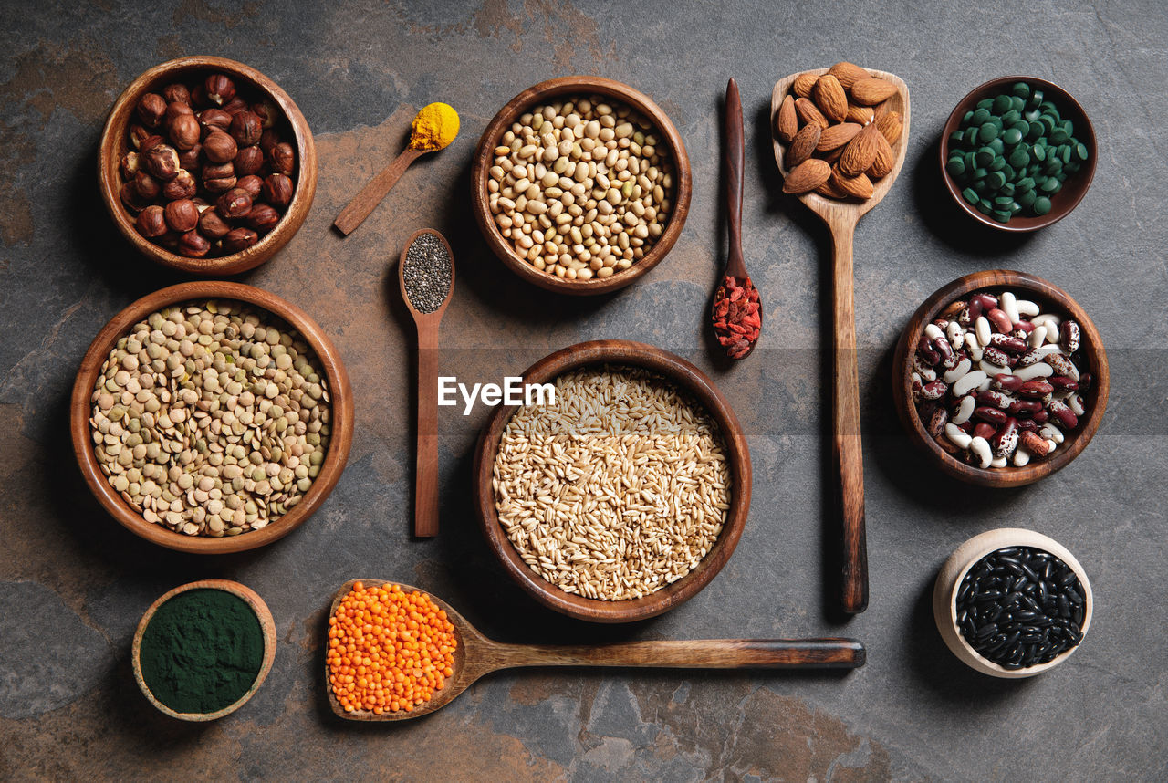 high angle view of various spices in bowls on table