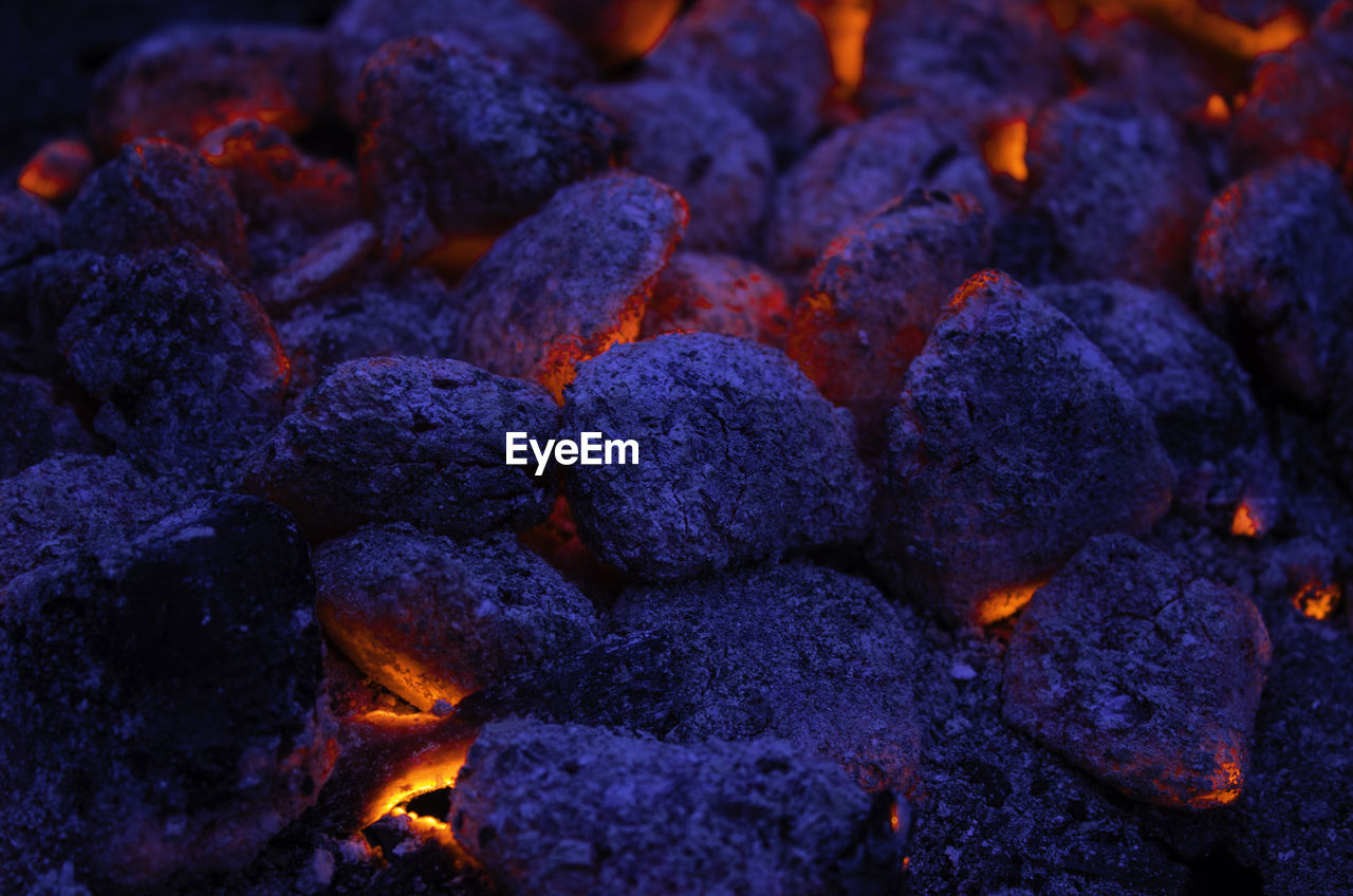 FULL FRAME SHOT OF MEAT AND BURNING