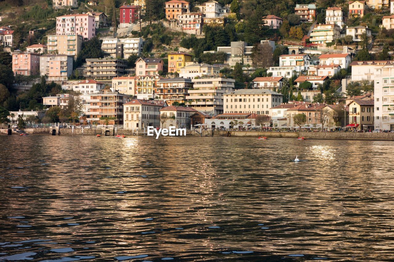 View of sea and buildings in town