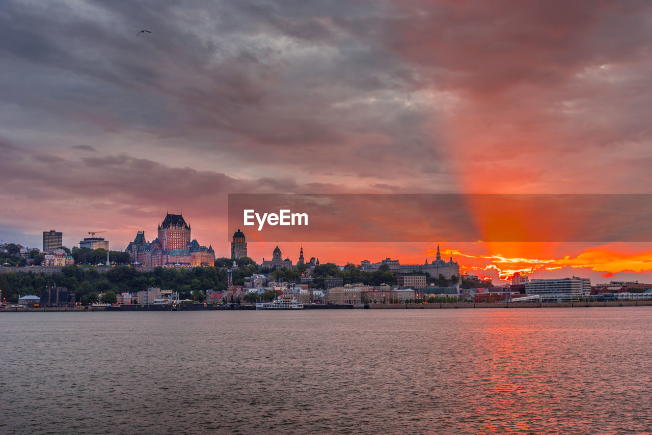 CITY BUILDINGS AT SUNSET