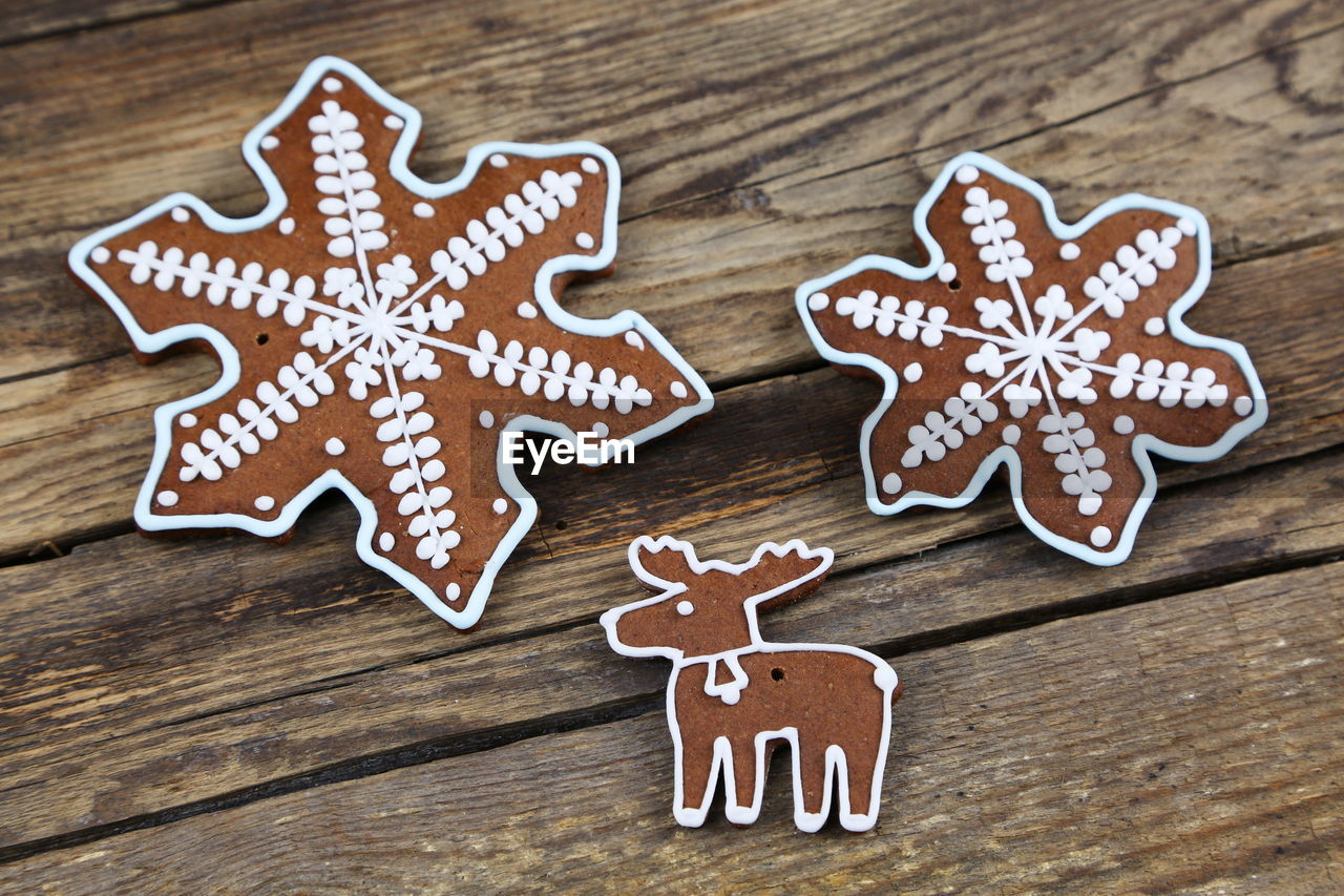 Close-up of gingerbread cookies on wooden table