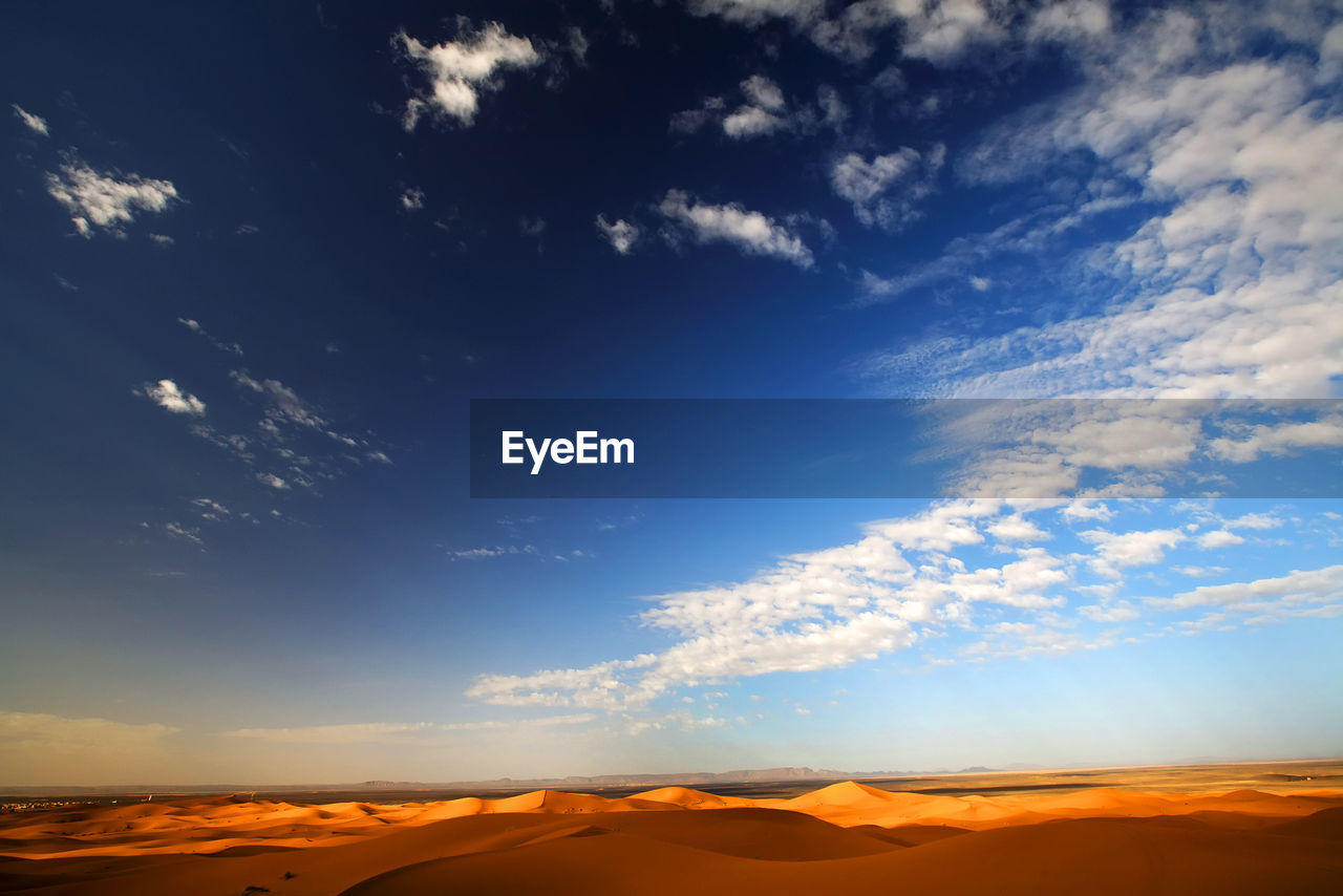 Scenic view of desert against sky