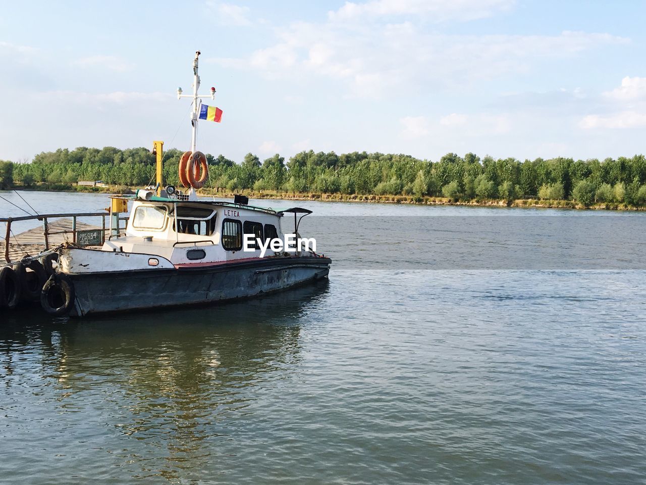 VIEW OF BOAT IN SEA