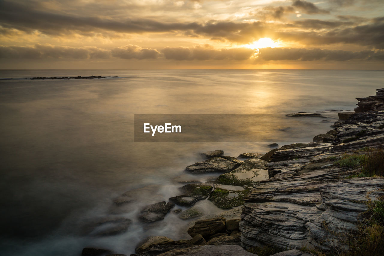 Scenic view of sea during sunset