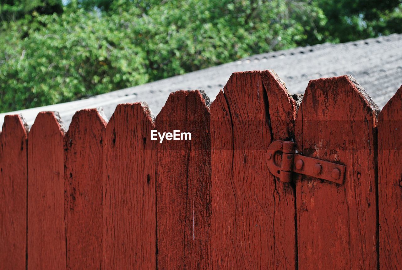 View of red wooden gate