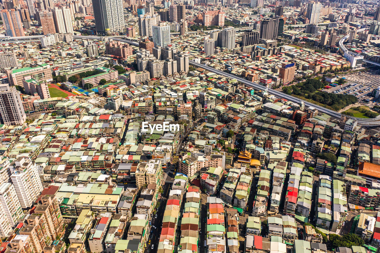 HIGH ANGLE VIEW OF CITY STREET AND BUILDINGS