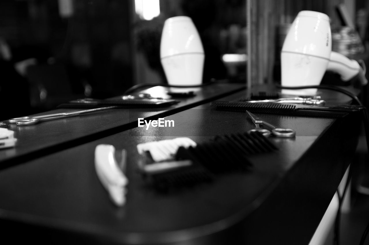 Close-up of hair accessories on table