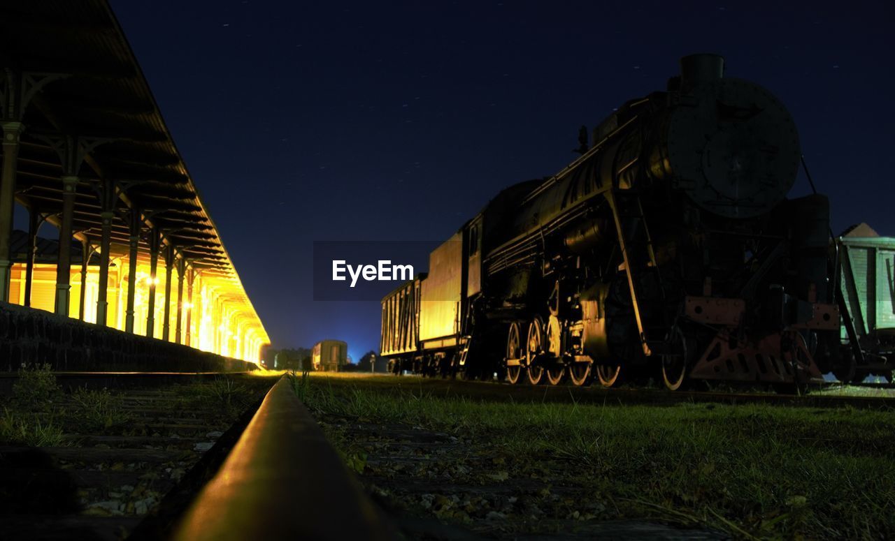 RAILROAD TRACK AT NIGHT