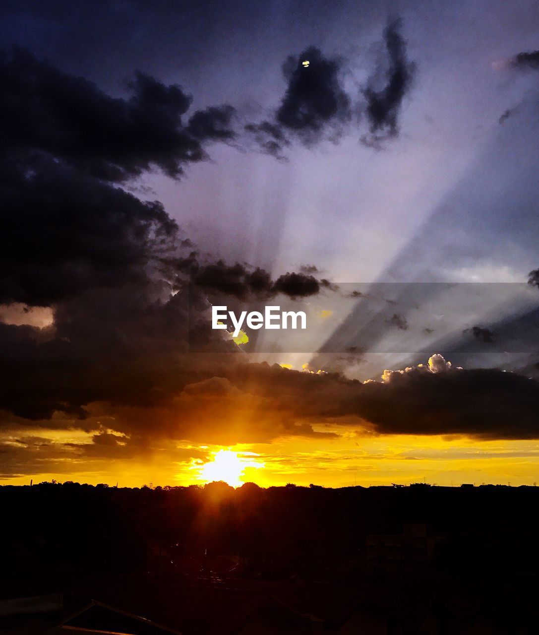 LOW ANGLE VIEW OF DRAMATIC SKY OVER SILHOUETTE LANDSCAPE