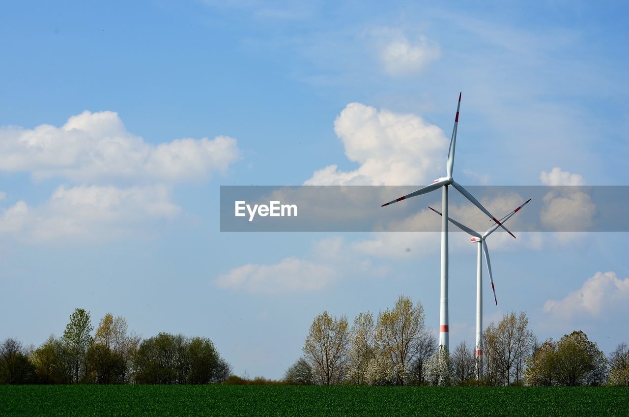 WIND TURBINES ON FIELD