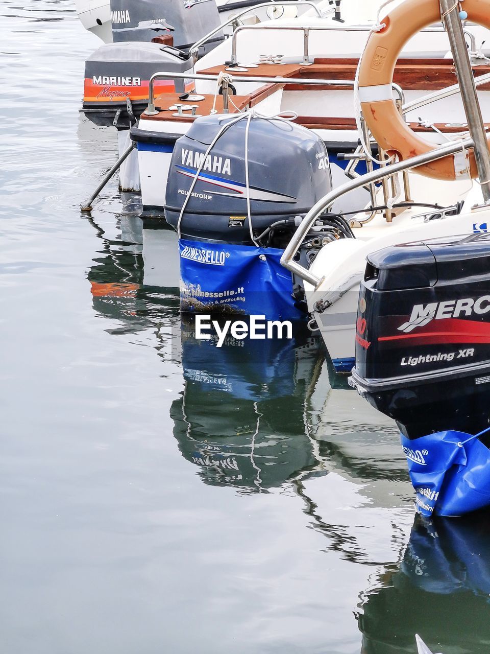 BOAT MOORED IN LAKE