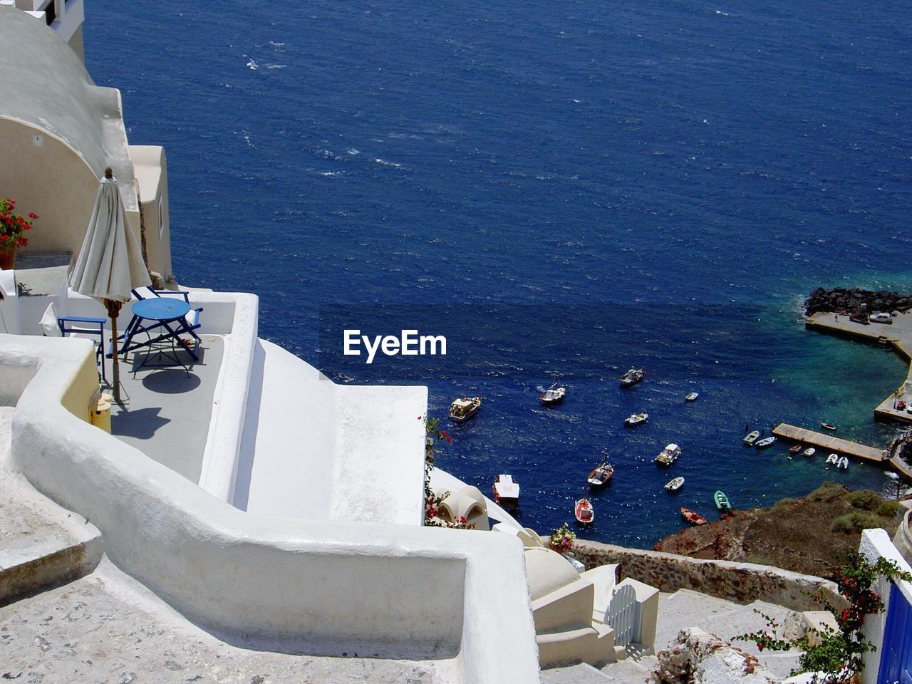 High angle view of boats in calm blue sea