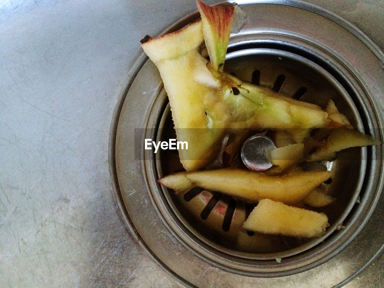 Directly above shot of apple in kitchen utensil