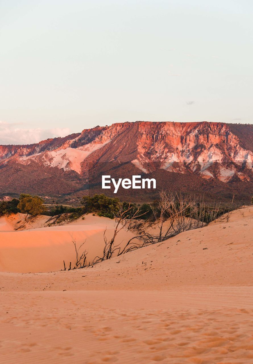 Scenic view of a pink mountain against sky