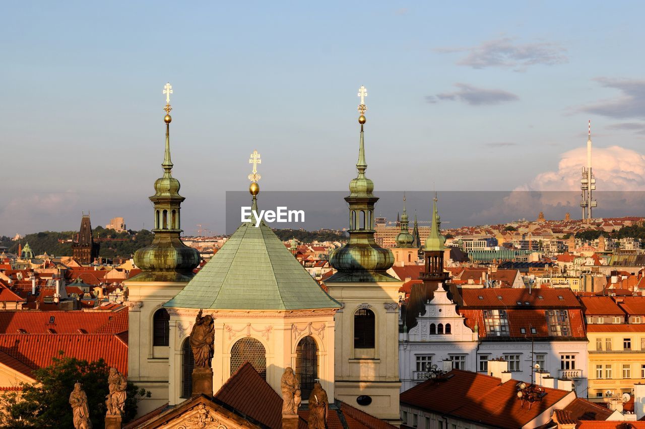 View of buildings in city against sky