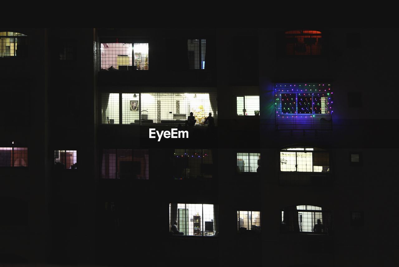 SILHOUETTE BUILDINGS AT NIGHT