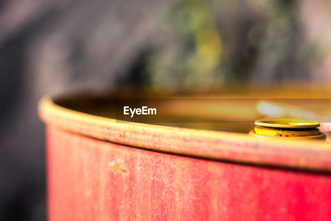 Close-up of rusty oil drum