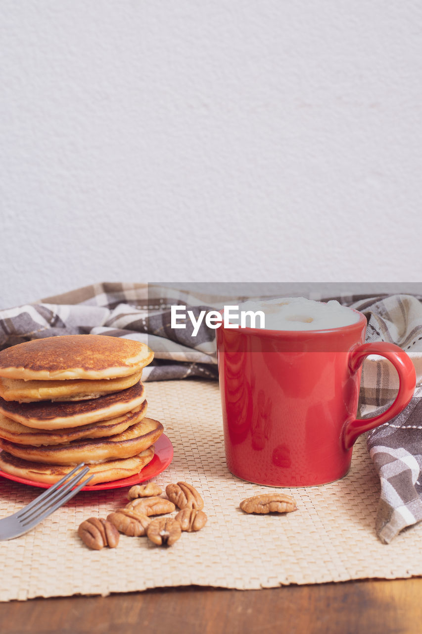 CLOSE-UP OF BREAKFAST SERVED WITH COFFEE