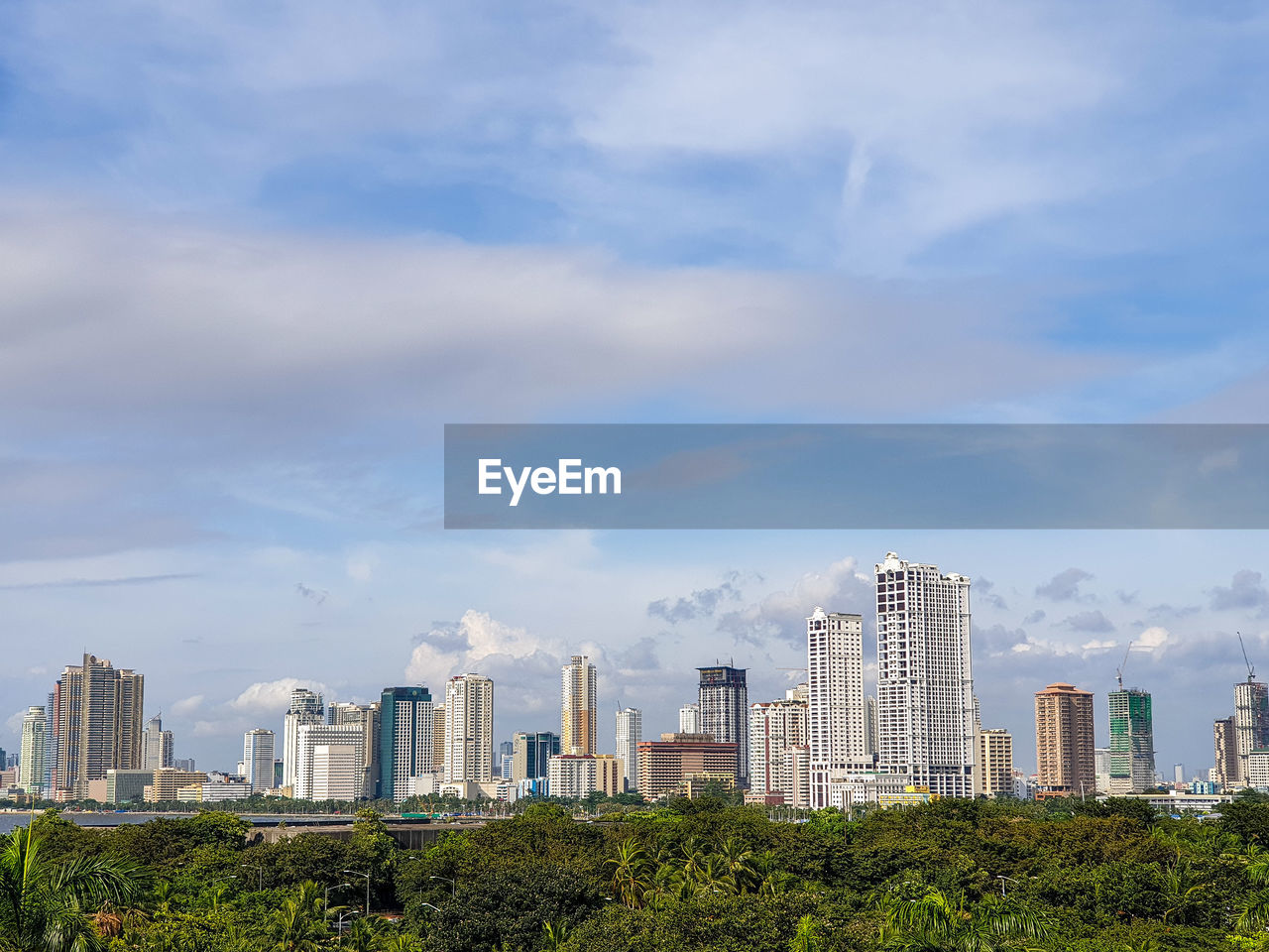 Panoramic shot of modern buildings against sky