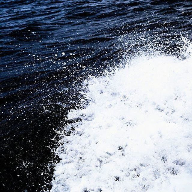 WAVES SPLASHING ON SHORE