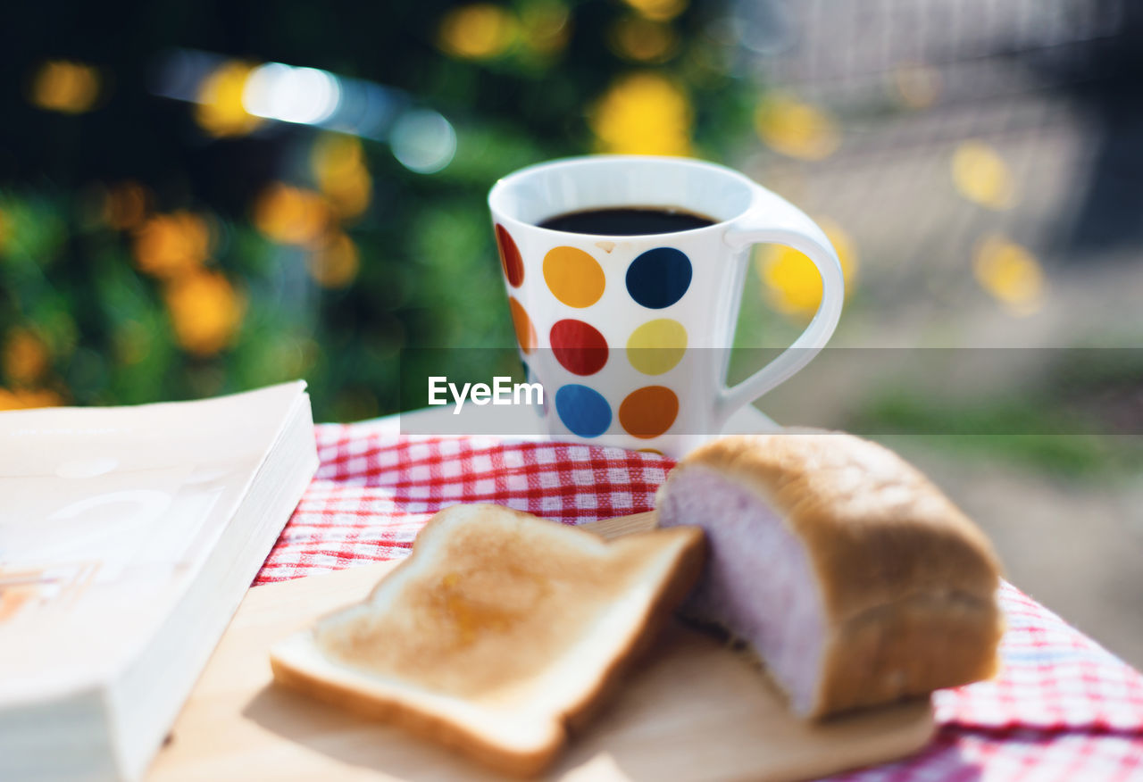 Close-up of coffee cup on table