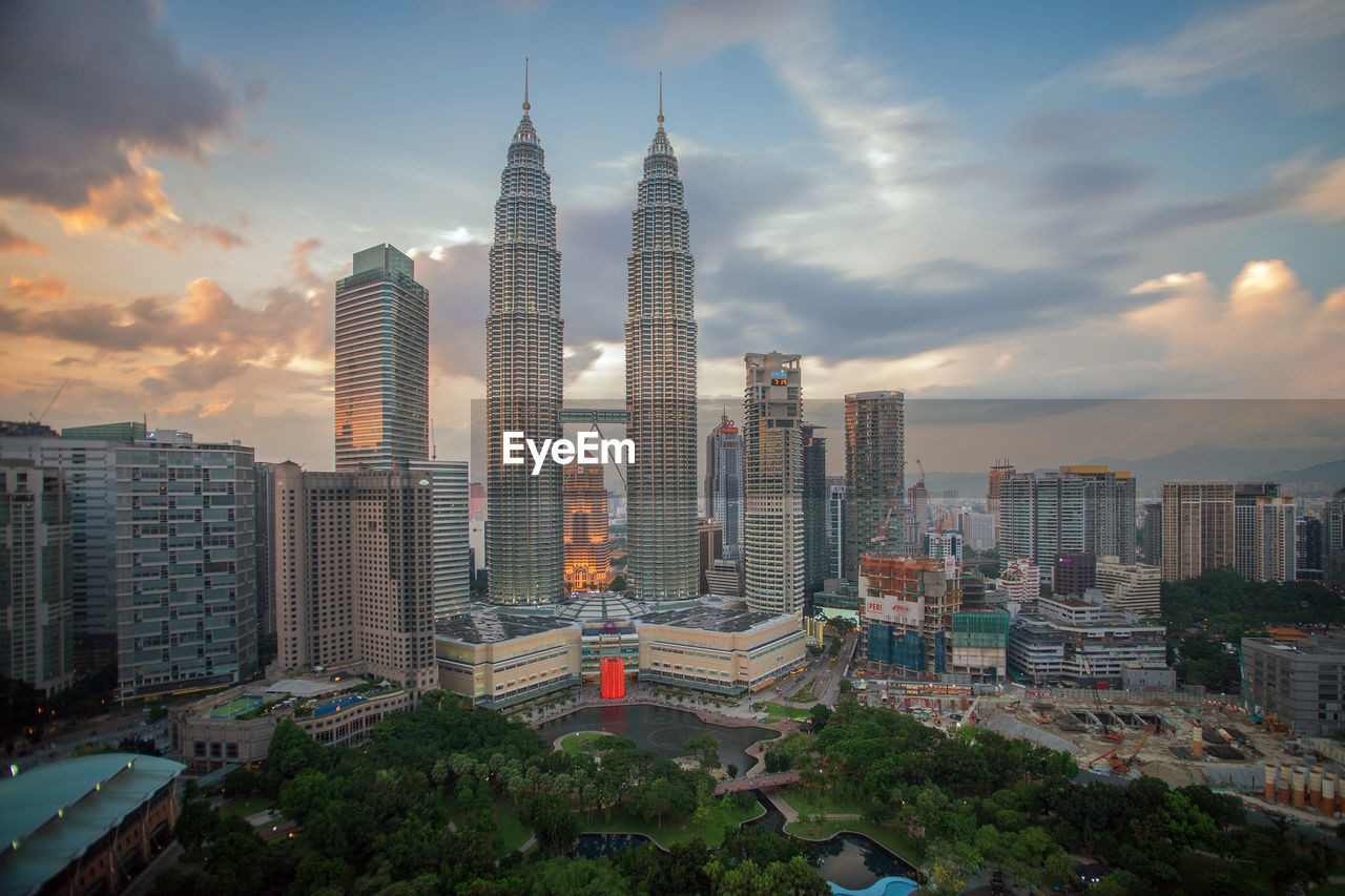 High angle shot of cityscape against the sky