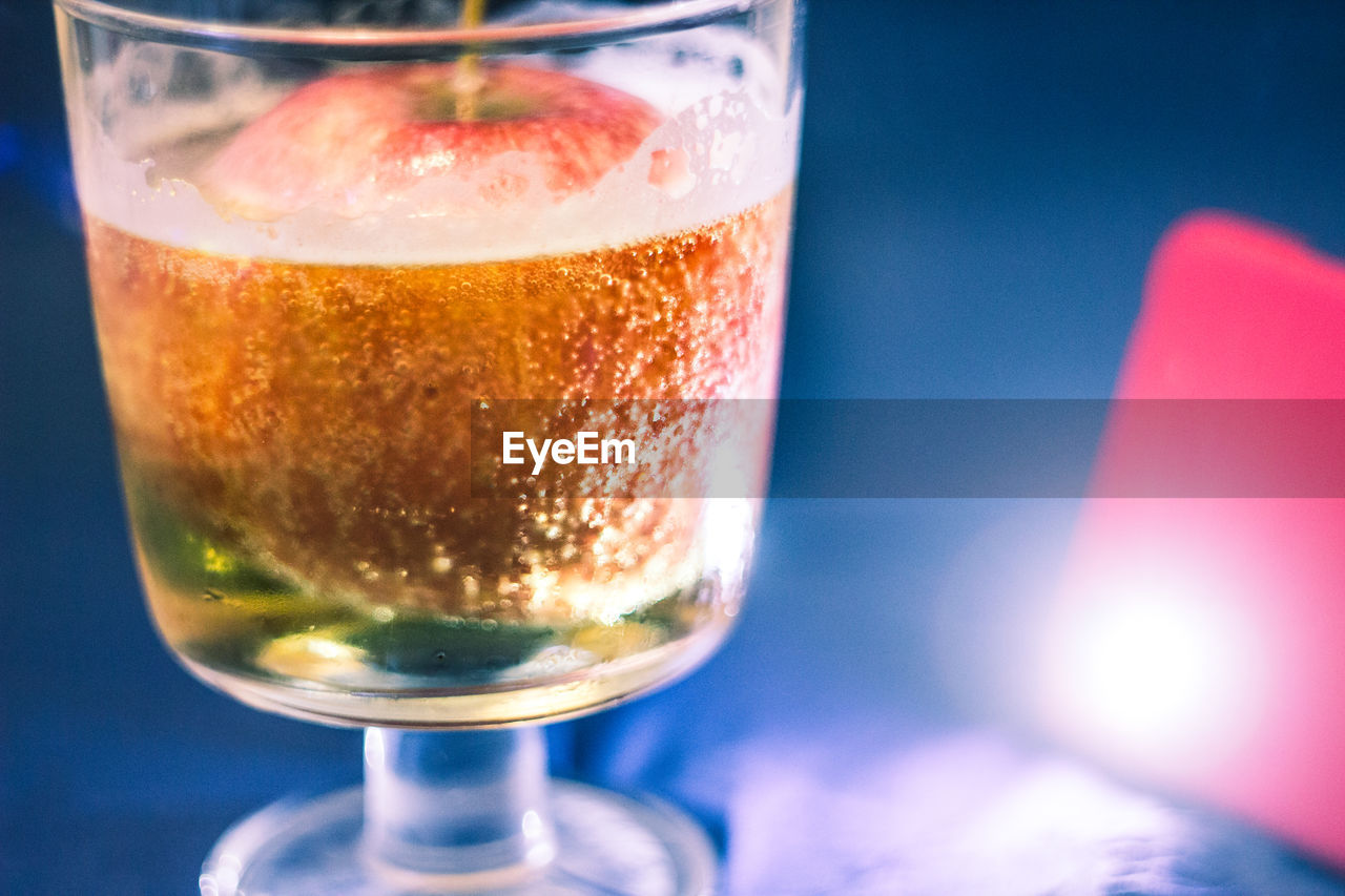 CLOSE-UP OF BEER ON TABLE