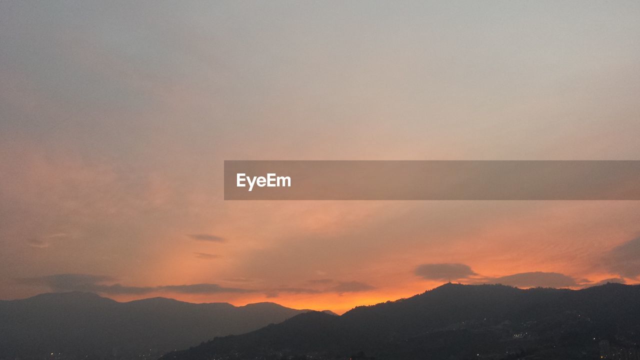 SCENIC VIEW OF MOUNTAIN AGAINST SKY