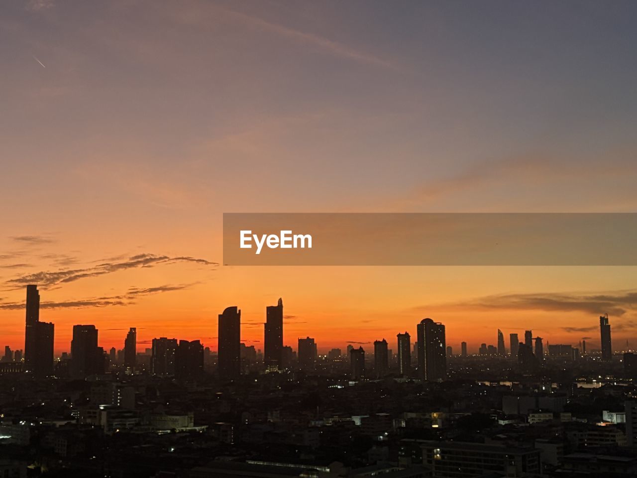 city, architecture, sky, building exterior, built structure, landscape, cityscape, building, urban skyline, sunset, office building exterior, skyscraper, horizon, skyline, nature, residential district, cloud, city life, travel destinations, afterglow, dawn, urban area, metropolitan area, no people, downtown district, tower, evening, development, outdoors, dramatic sky, environment, business, illuminated, business finance and industry, travel, silhouette, sunlight, office, metropolis, high angle view, scenics - nature