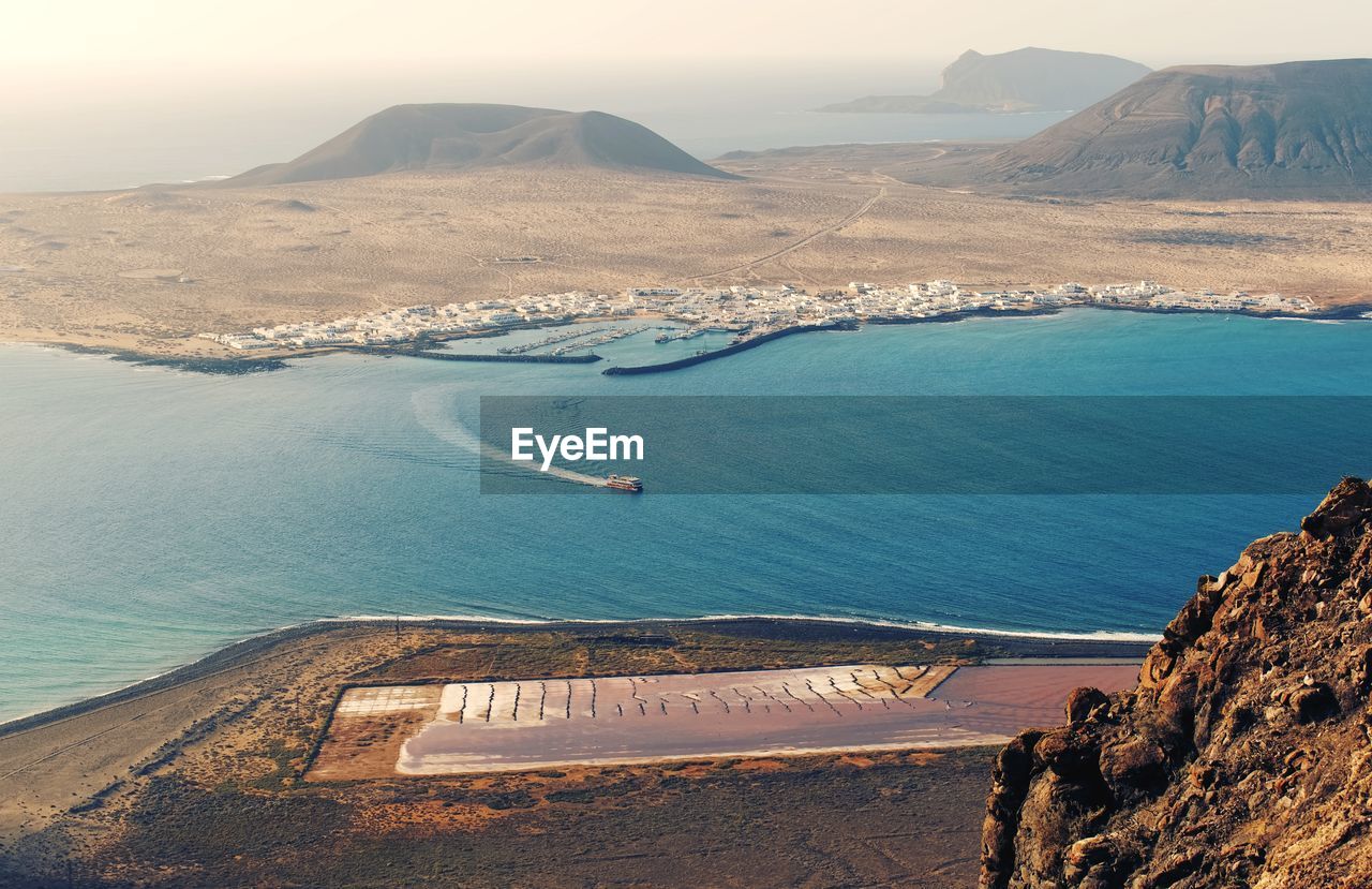 Coastal scenery, view from mirador de nahum on island la graciosa, caleta del sebo at lanzerote