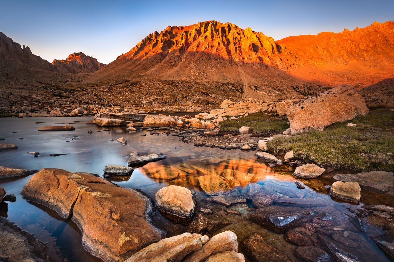 Scenic view of mountains against clear sky