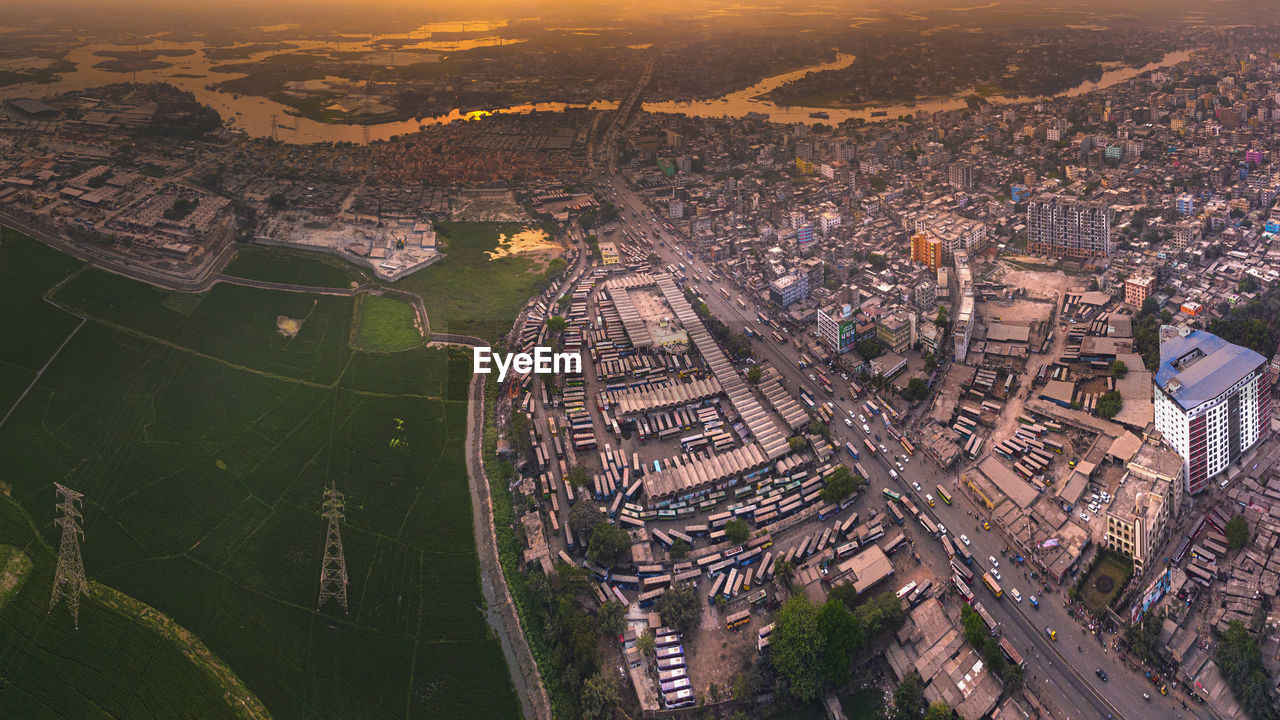 High angle view of illuminated cityscape against sky