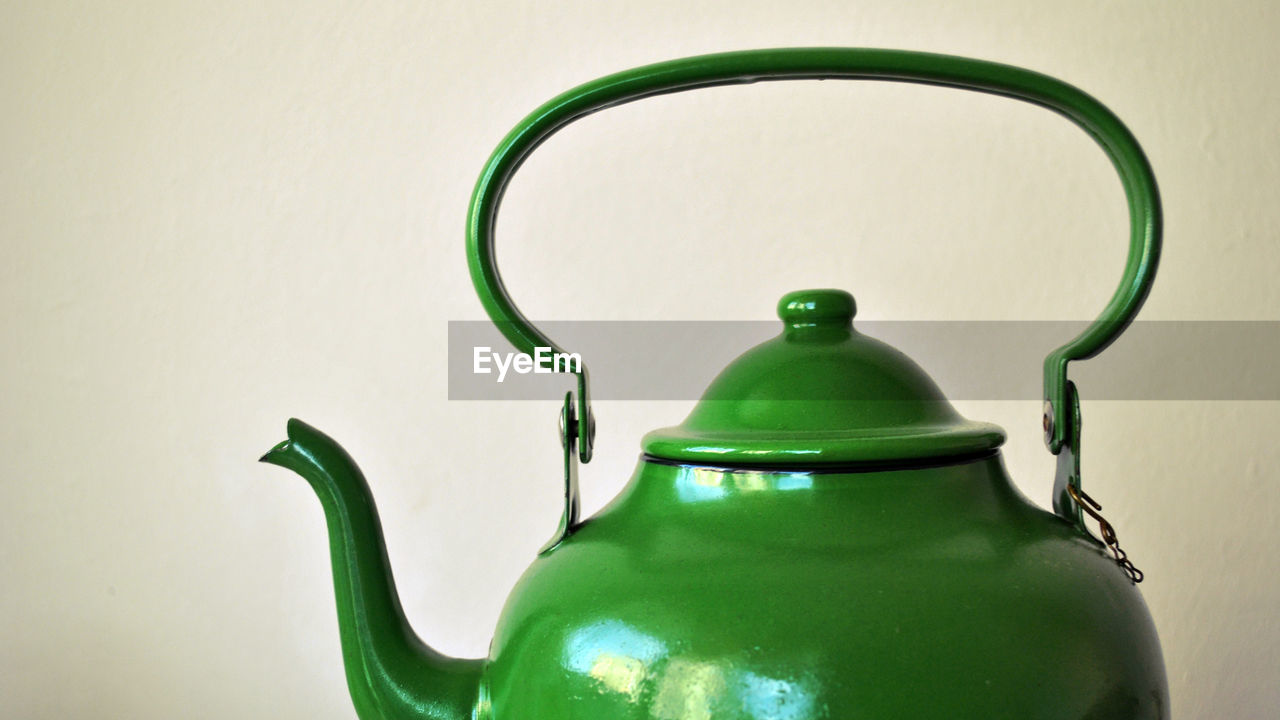 Close-up of green color tea kettle