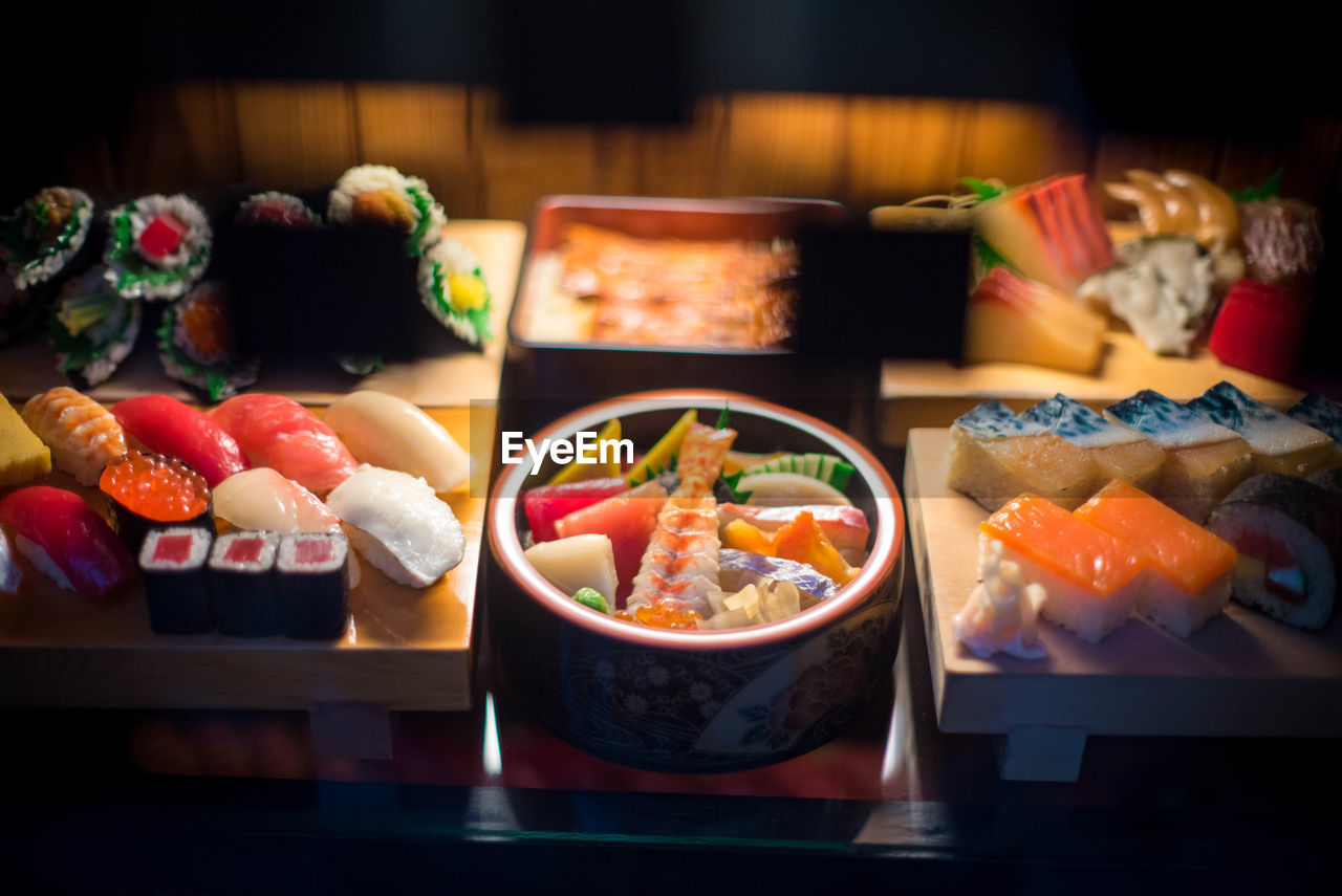 CLOSE-UP OF SUSHI ON TABLE