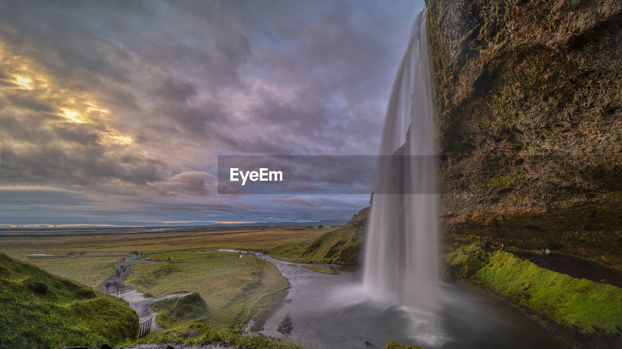 SCENIC VIEW OF WATERFALL
