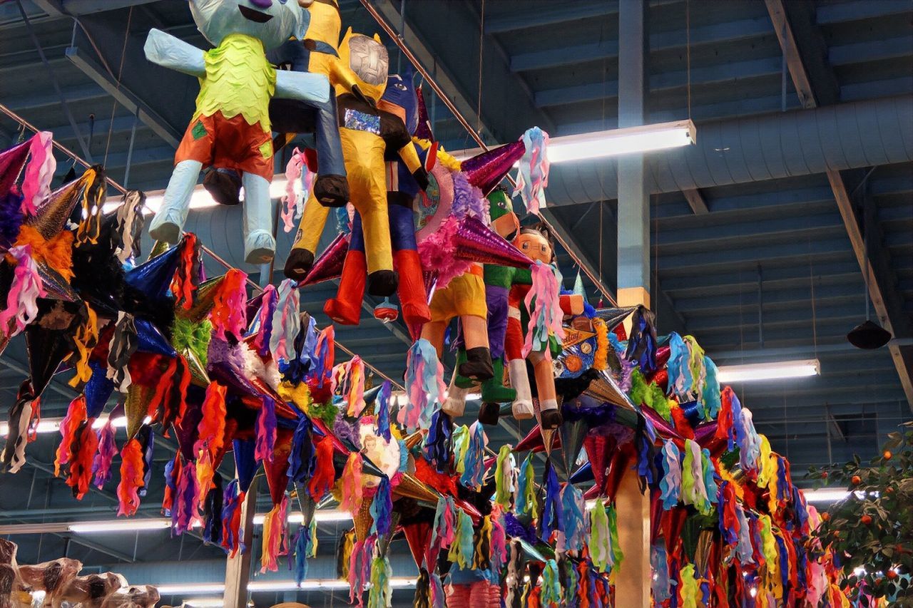 PANORAMIC VIEW OF FLAGS HANGING ON DISPLAY