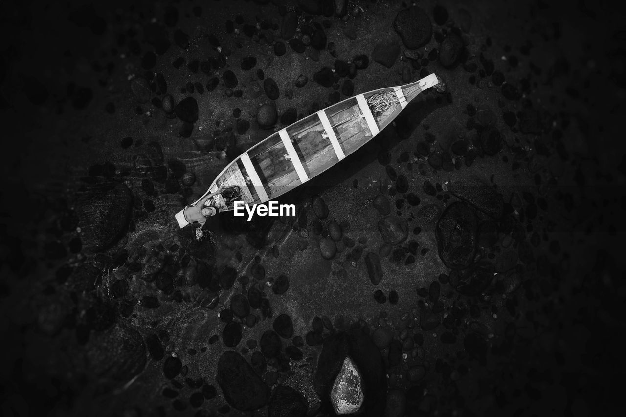 High angle view of a boat floating on sea