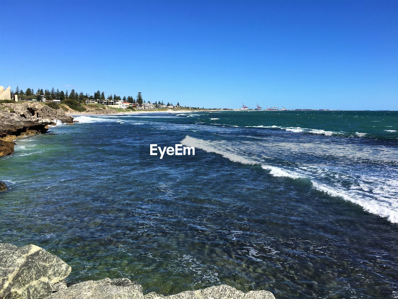 SCENIC VIEW OF SEA AGAINST BLUE SKY